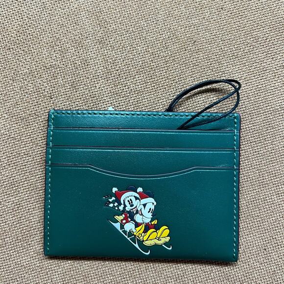 B05 NWT Disney X Coach Slim Id Card Case With Winter Motif - Picture 1 of 2